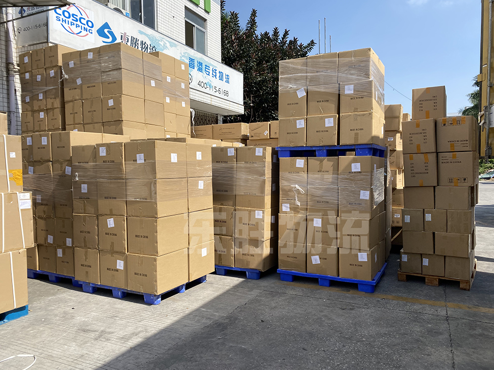 防疫物資出口，防護(hù)口罩出口裝貨運(yùn)輸現(xiàn)場(chǎng)圖；深圳東勝物流